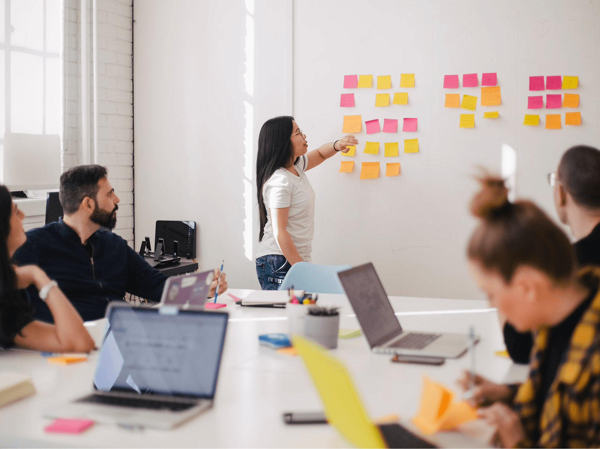 Agency team reviewing website designs together